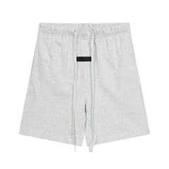 Fear of God Essentials Fleece Shorts – Light Oat
