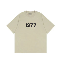 Fear of God Essentials 1977 Flocked Tee – Camel